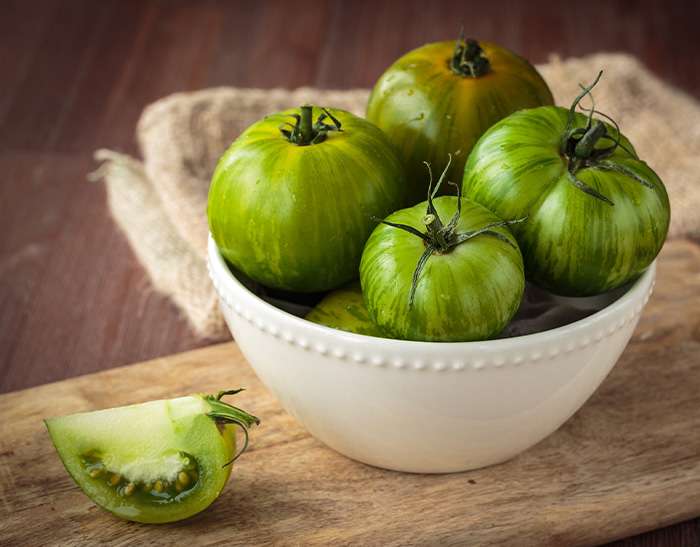 Pomodori verdi sott’olio: la ricetta per una conserva non convenzionale.